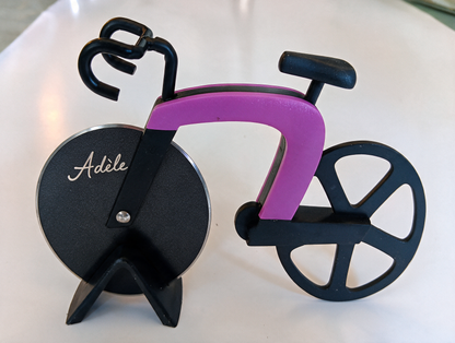Coupe-Pizza Vélo piste – L'accessoire aussi insolite qu'efficace